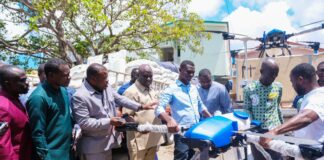 Agric Minister presents 40,000 bags of inorganic fertilisers, 5 agriculture drones and 500 boxes of organic fertilisers to Peasant Farmers Association.