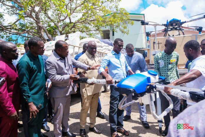 Hon. Eric Opoku, Minister for Food and Agric and the Peasant Farmers with drone distribution